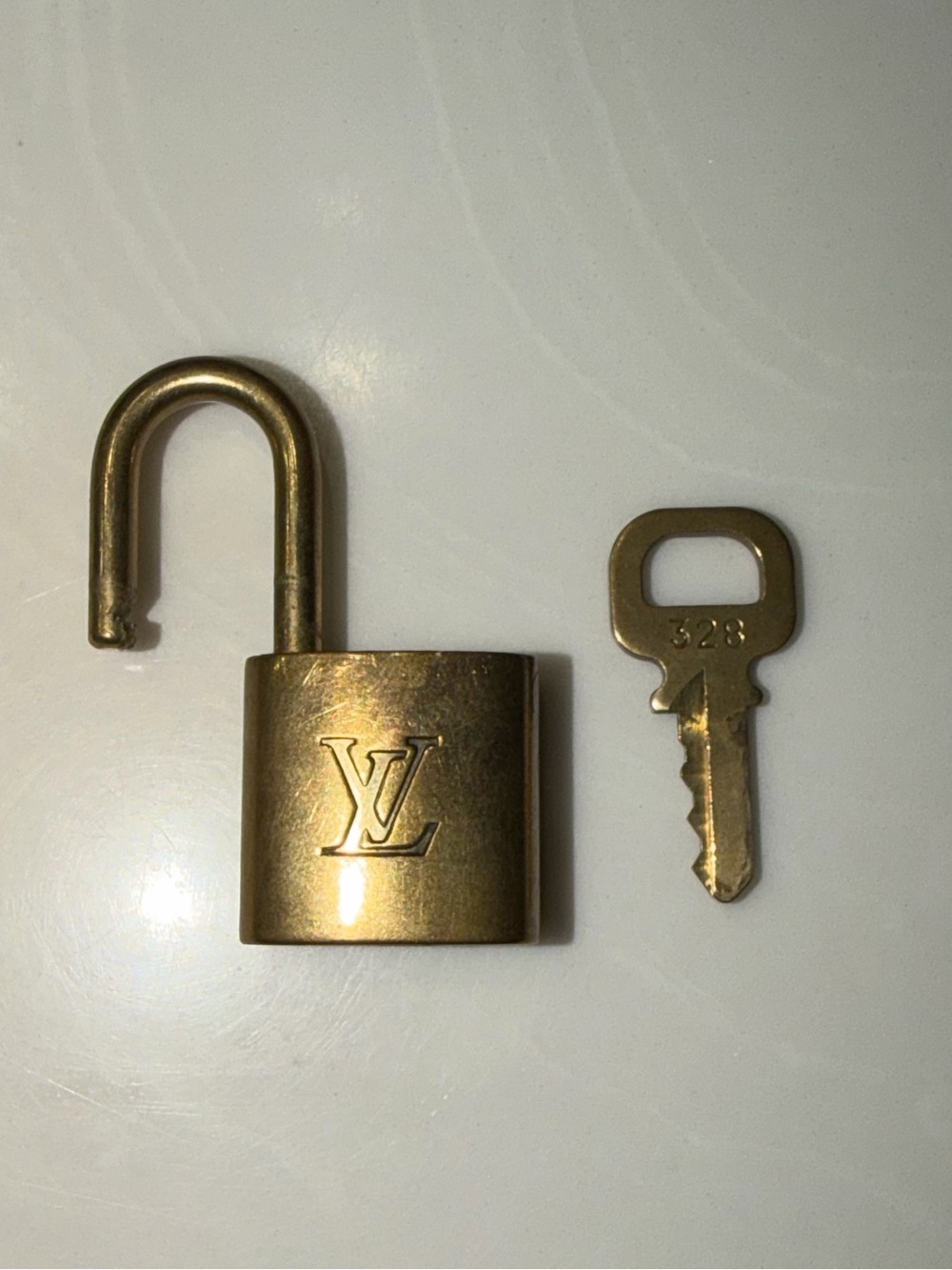Louis Vuitton Gold-Tone Padlock and Key Set